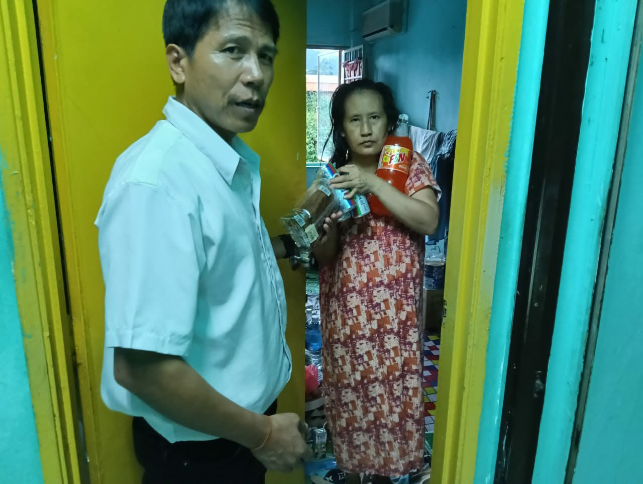 Shelter staff visiting a resident